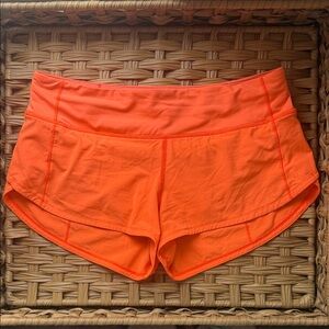 Lululemon Speed Up Shorts bright orange color Size 6